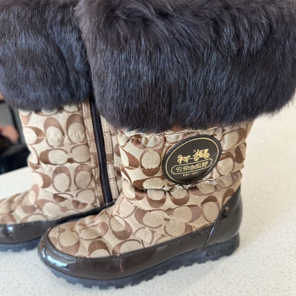 Coach Joyous boots. Brown CC print boots with fur trim.
